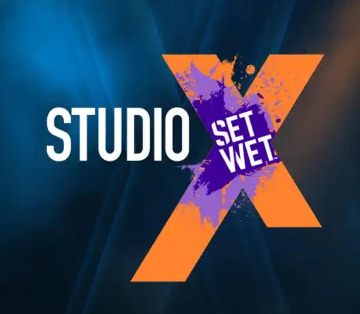 Studio X Set Wet logo with vibrant colors and bold design.