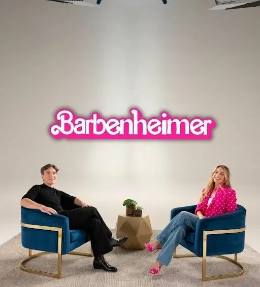 Barbenheimer interview setup with two seated individuals.